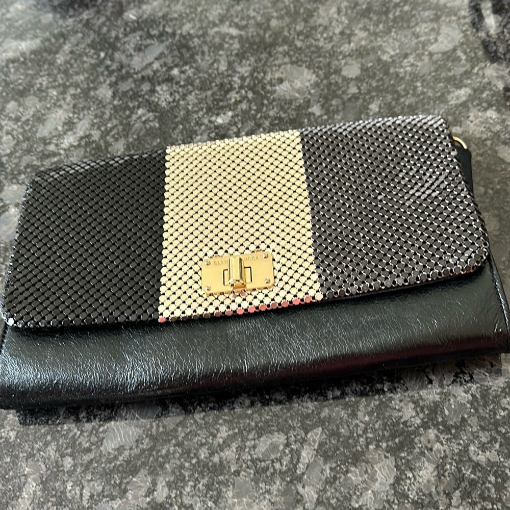 Elliot Luca black leather clutch with gold mesh detail